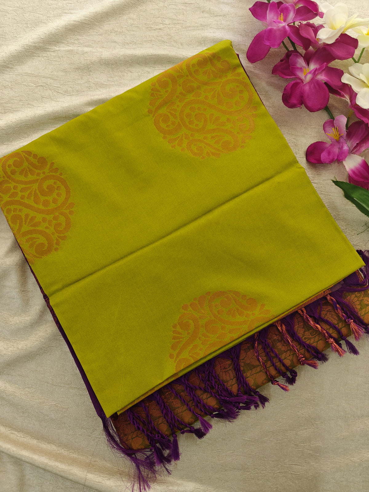 Green with Purple Copper Zari Woven Border Semi Soft Silk Saree