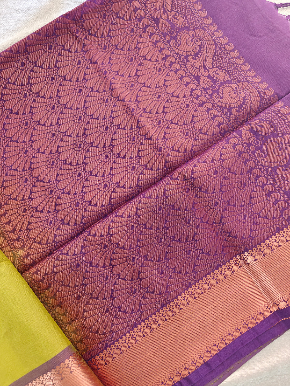 Green with Purple Copper Zari Woven Border Semi Soft Silk Saree