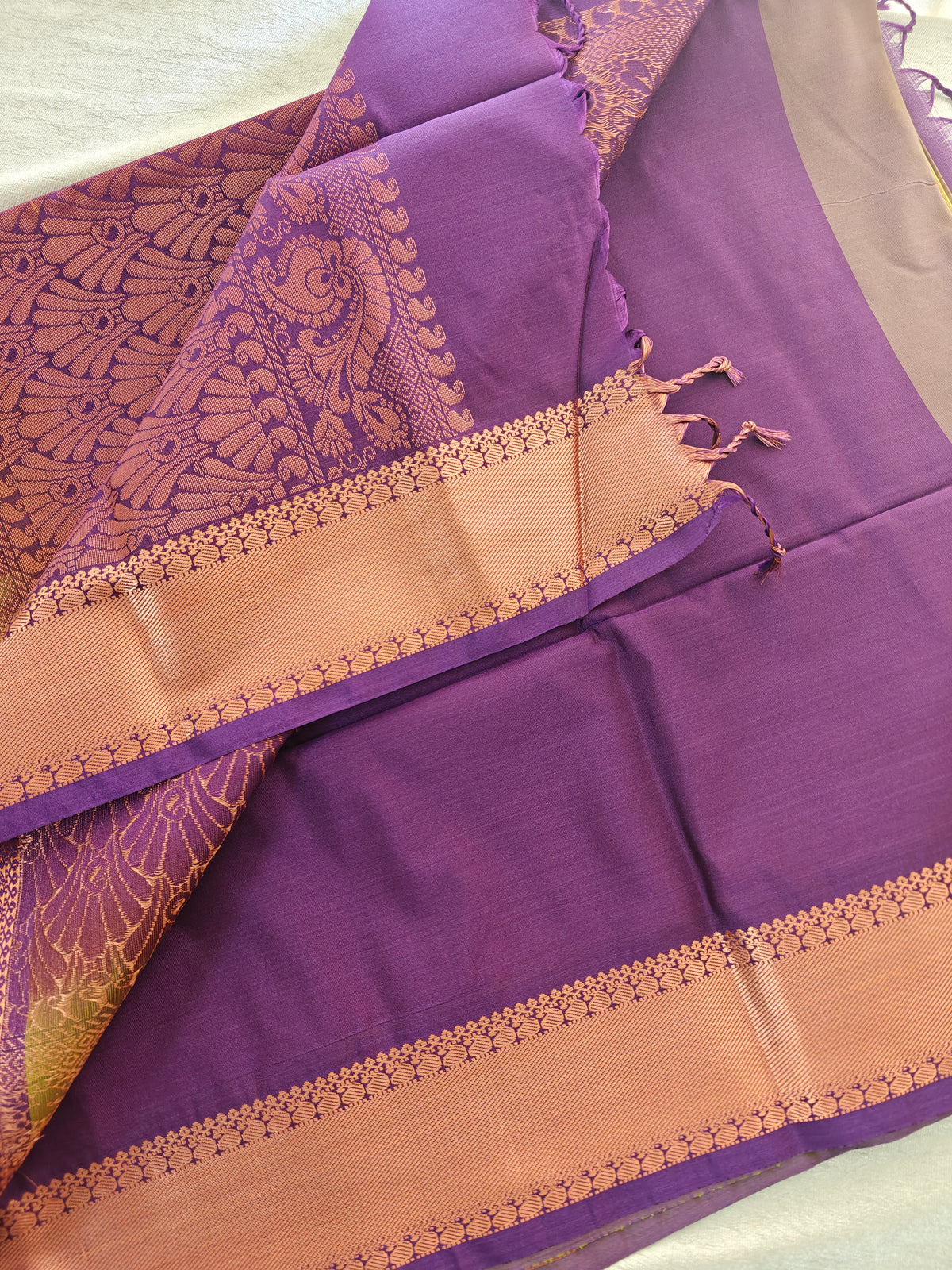 Green with Purple Copper Zari Woven Border Semi Soft Silk Saree