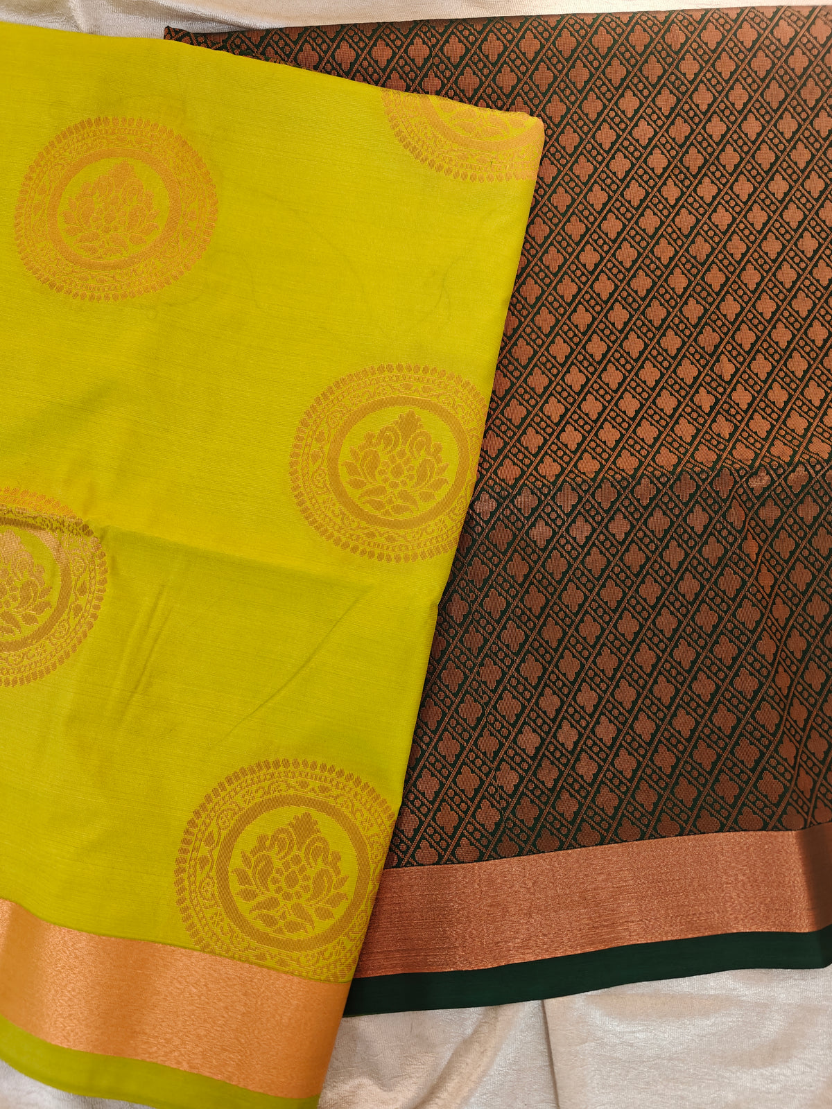 Green with Dark Green Copper Zari Woven Border Semi Soft Silk Saree