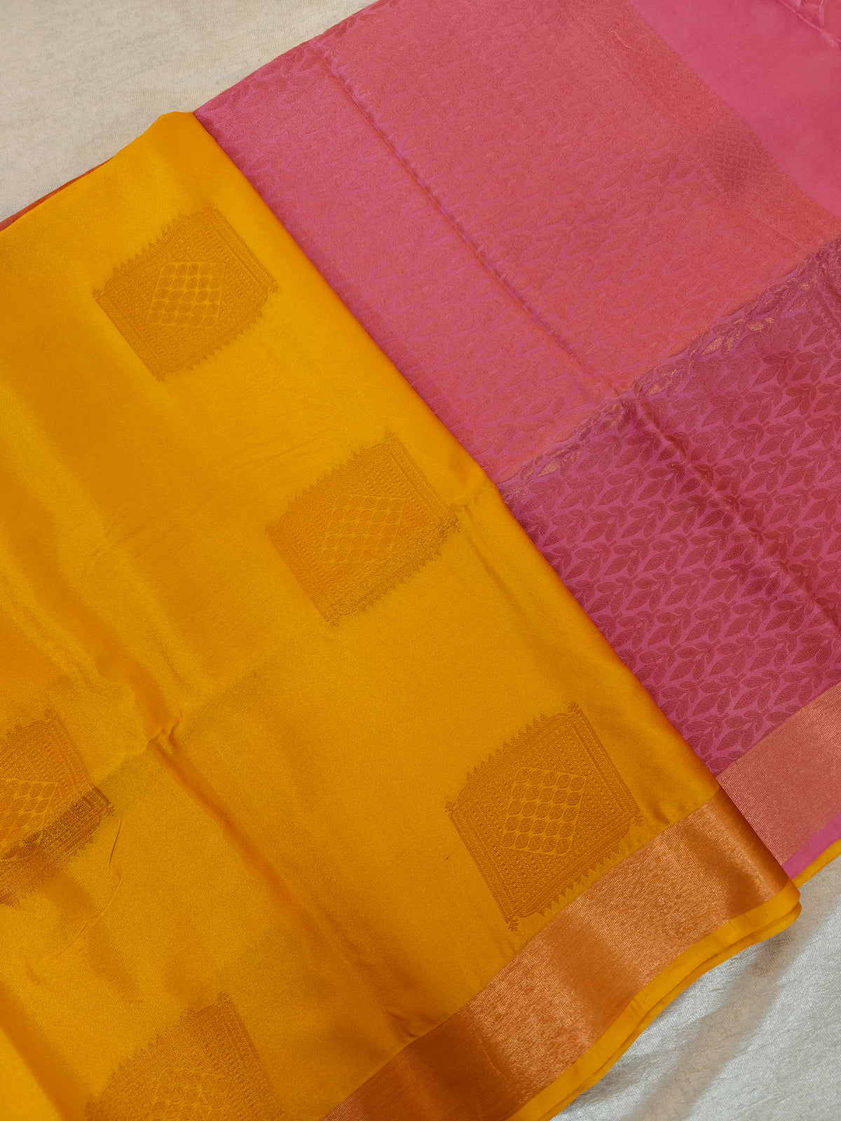 Yellow with Pink Copper Zari Woven Border Semi Soft Silk Saree