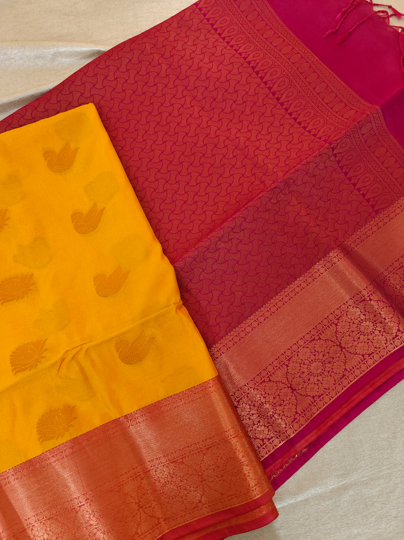 Yellow with Dark Pink Copper Zari Woven Border Semi Soft Silk Saree