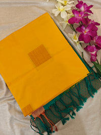 Yellow with Sea Green Copper Zari Woven Border Semi Soft Silk Saree