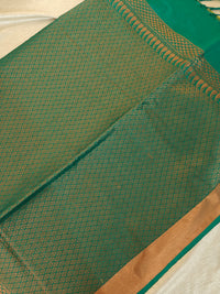 Yellow with Sea Green Copper Zari Woven Border Semi Soft Silk Saree