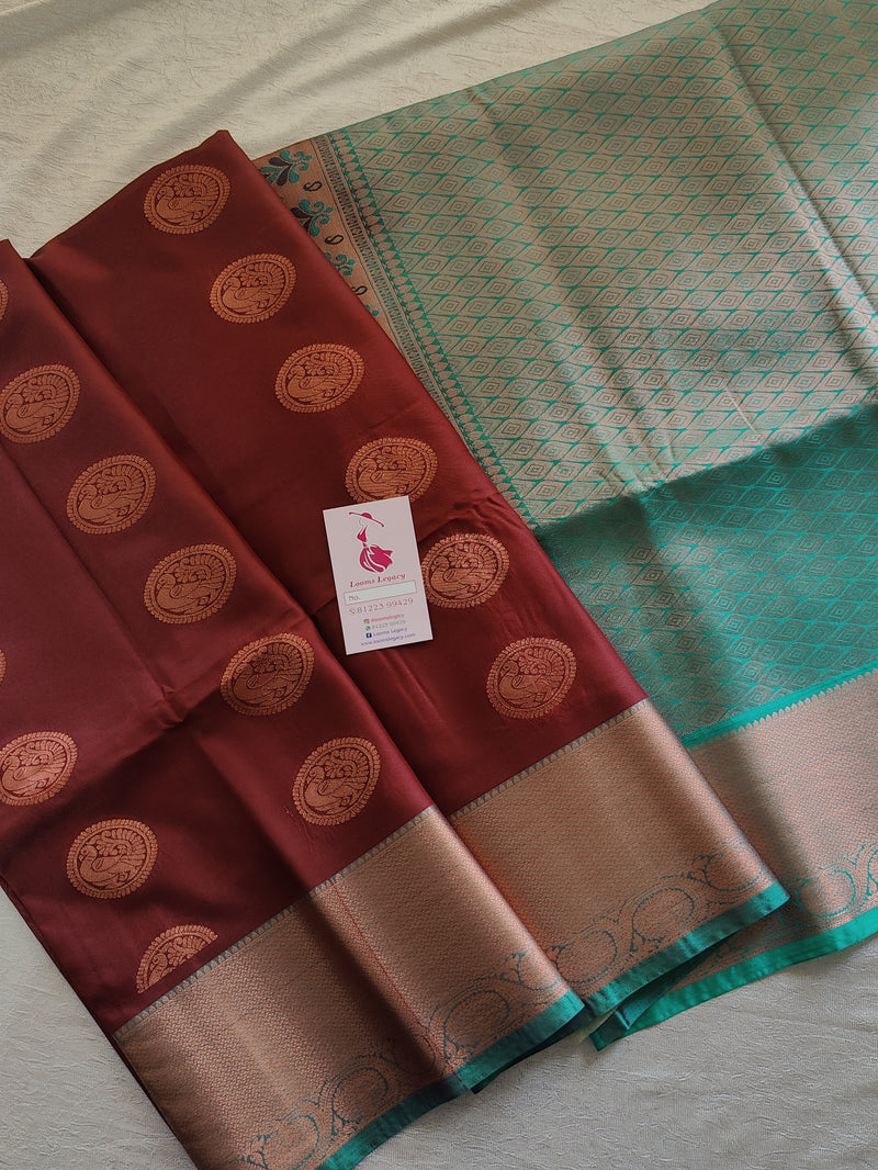 Brown with Sea Green Copper Zari Woven Border Semi Soft Silk Saree