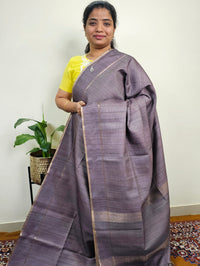 𝐏𝐫𝐞-𝐛𝐨𝐨𝐤𝐢𝐧𝐠 𝐀𝐯𝐚𝐢𝐥𝐚𝐛𝐥𝐞 𝟐𝟎 𝐝𝐚𝐲𝐬 𝐃𝐢𝐬𝐩𝐚𝐭𝐜𝐡 𝐓𝐢𝐦𝐞 Soft Semi Tussar with Zari Weaving Saree - Metalic Grey